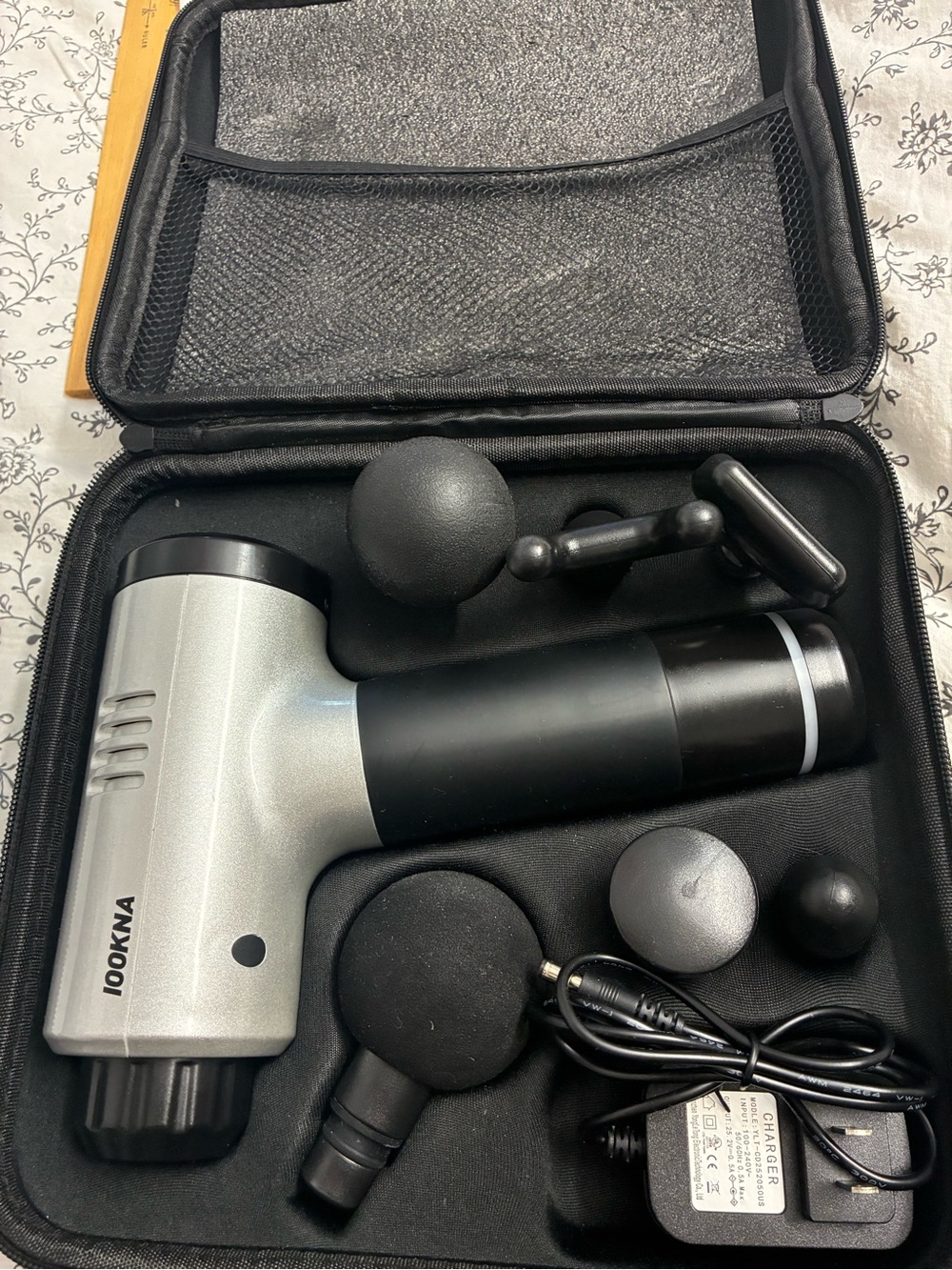 Silver and Black Percussion Massage Gun with Accessories
